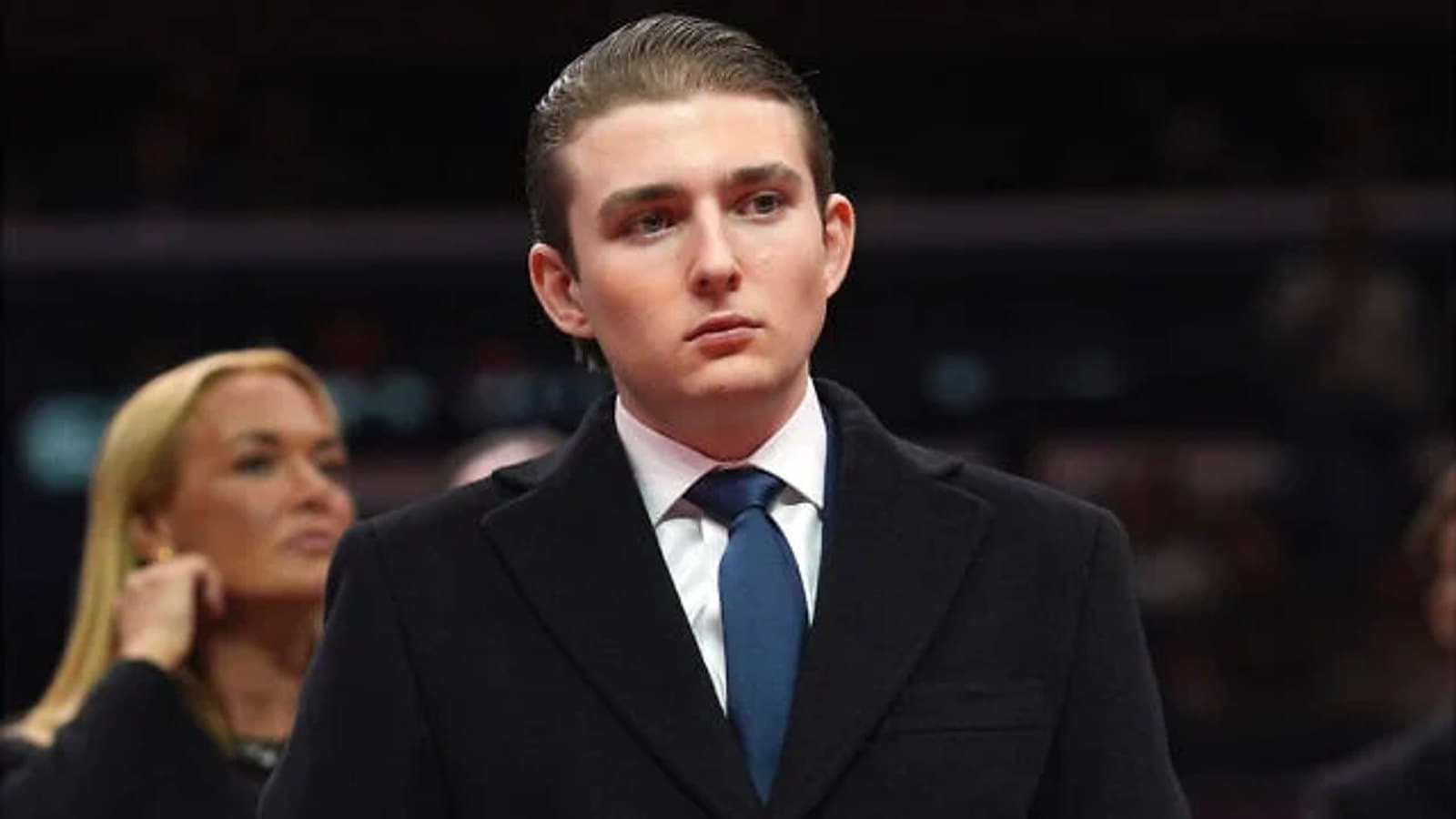 Barron Trump standing at a public event. File photograph.