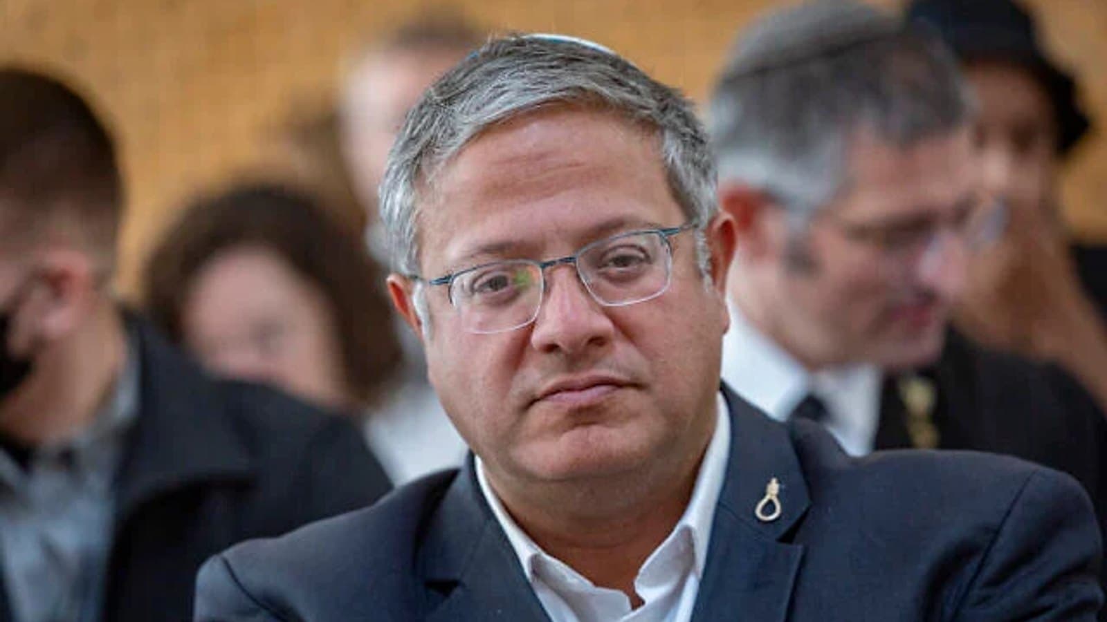 Itamar Ben Gvir seated among a crowd. File photograph.