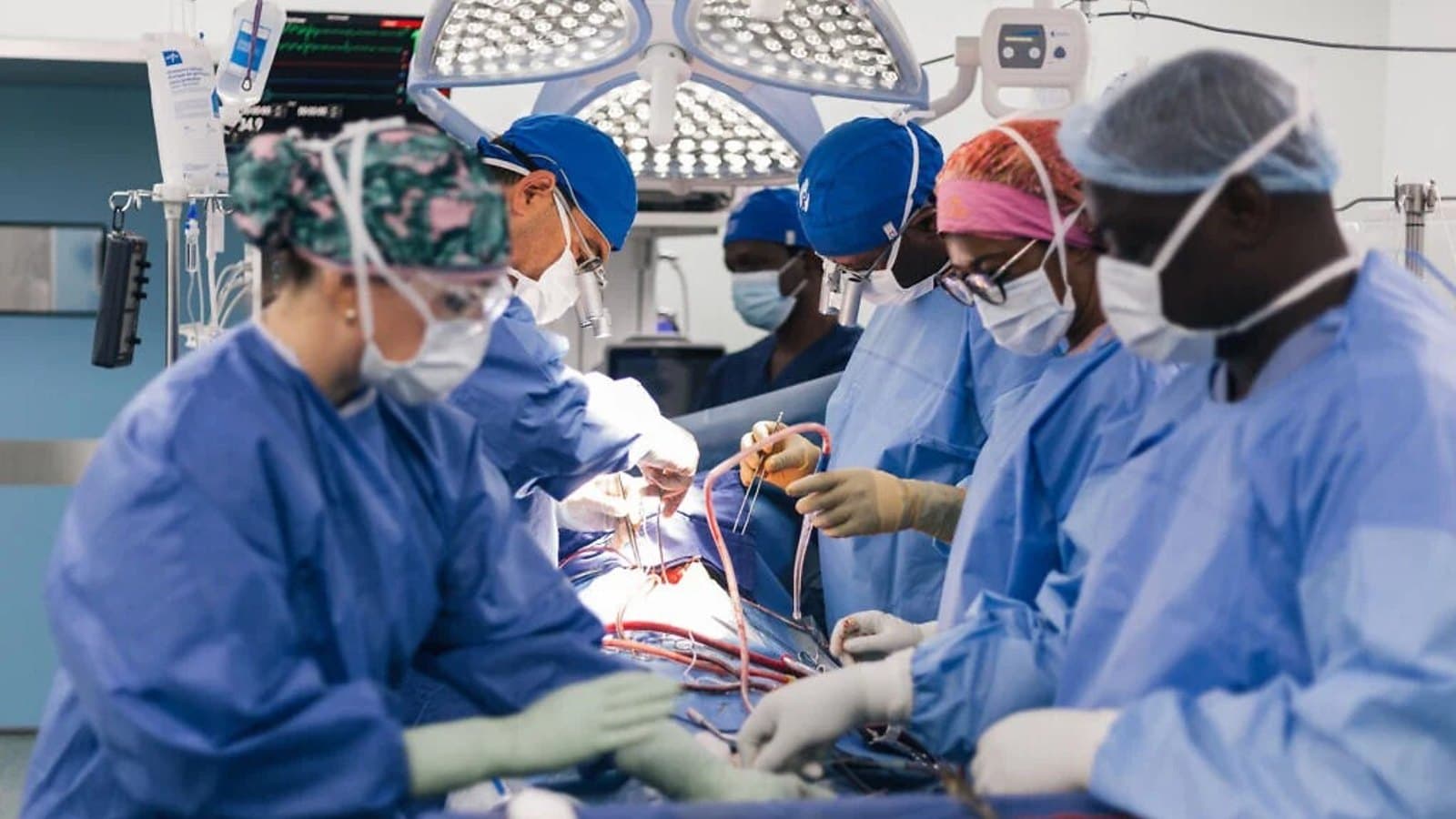 A surgical team operating on a child in a cardiac theatre. File photograph.