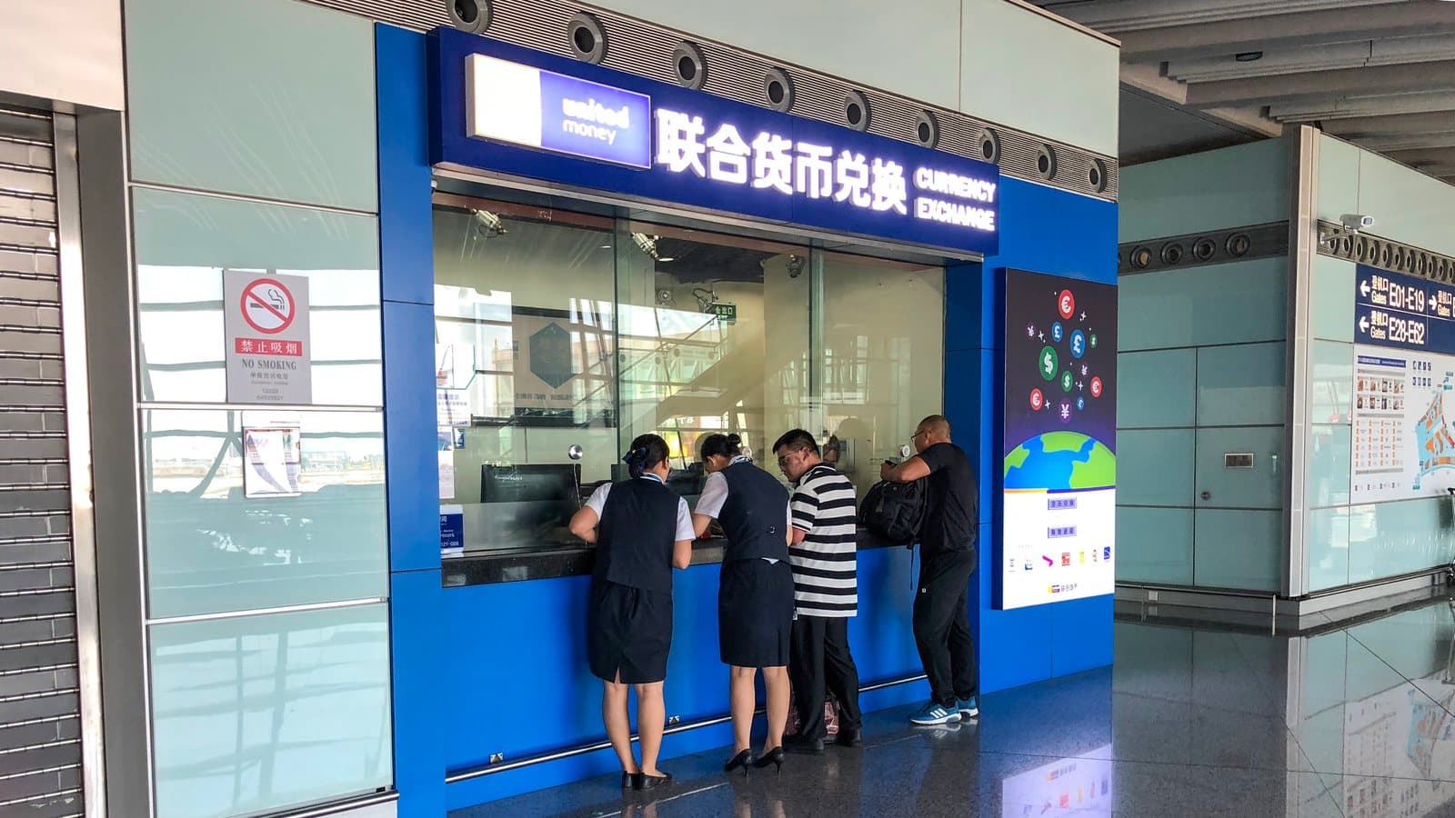 Currency exchange counter at ZBAA T3E Departures. File photograph.