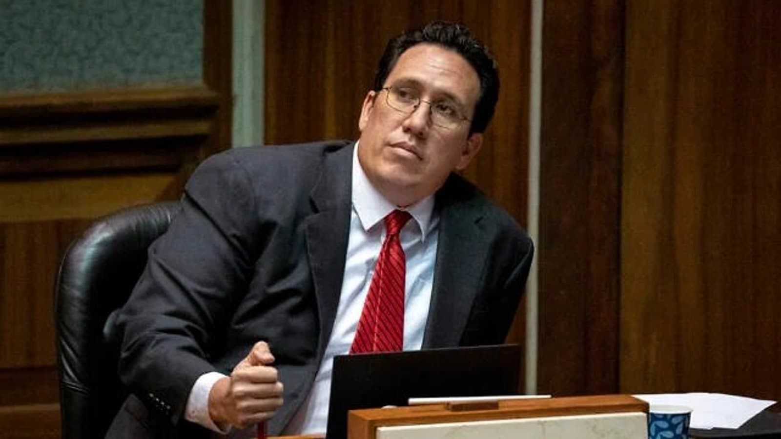 Hawaii state senator Jarrett Keohokalole at his desk in the state legislature. File photograph.