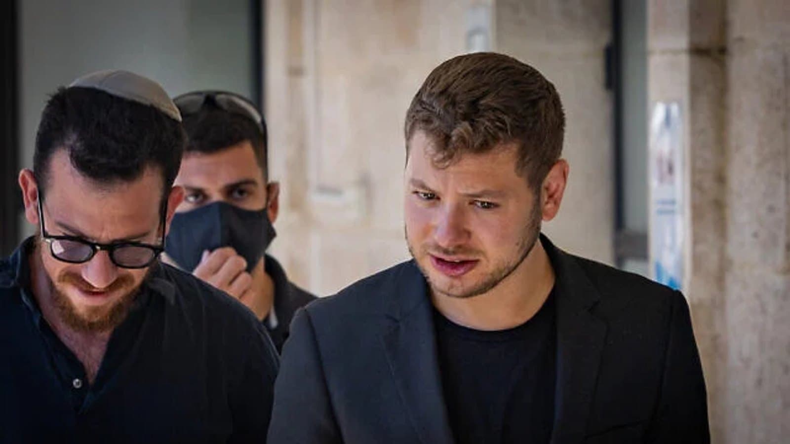Yair Netanyahu walking with two other men. File photograph. תצלום ארכיון.